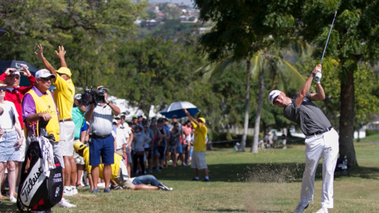 Thomas caps off record week with trophy at Sony Open